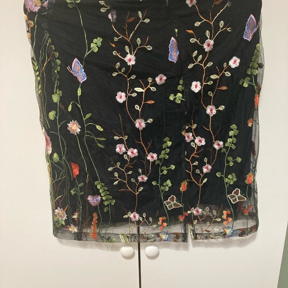 Beautiful skirt with flower patterns. Worn once. Like new - Picture 2 of 3